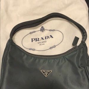 Small Prada hand bag (has some stains)